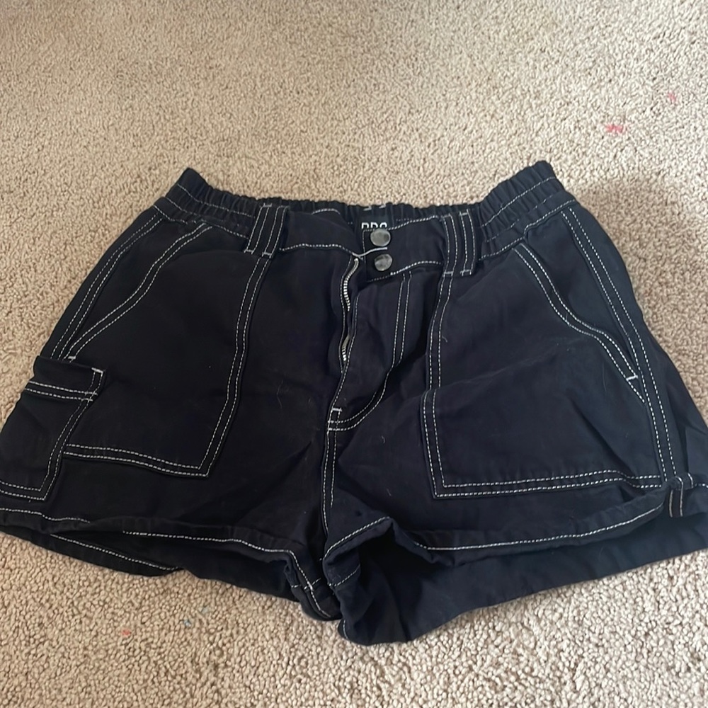 black jean shorts with white seam